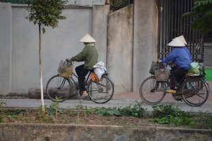 Local Cyclists in Hanoi, Vietnam